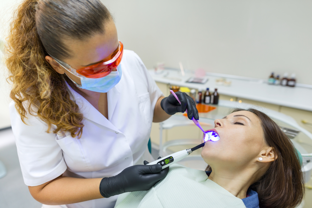 sedated patient receives treatment